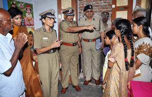 TIMELY HELP: Letika Saran, DGP, at the residence of constable Nagarathinam in Sivakasi on Tuesday. Photo: Special Arrangement | The Hindu